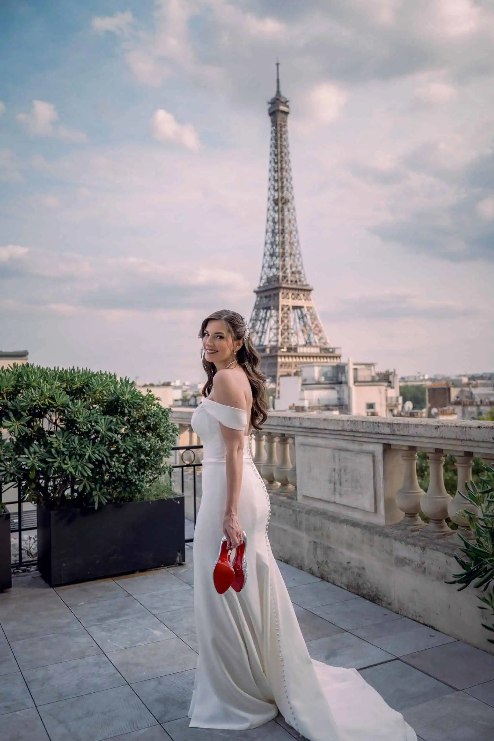 Bride smiling white gown red shoes rooftop Eiffel Tower front Paris - Paris by Finzi
