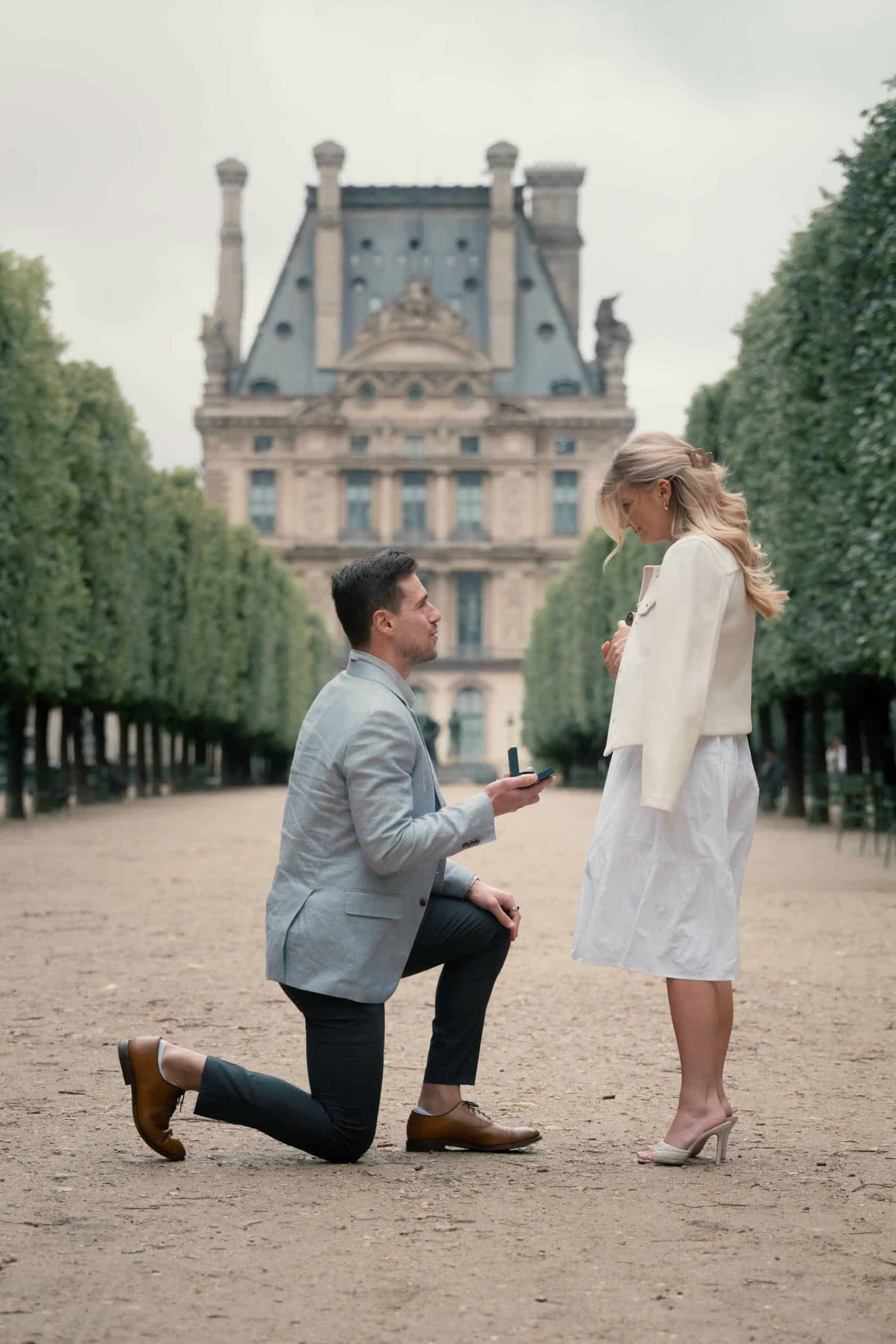 Surprise proposal in Tuileries Garden, Paris