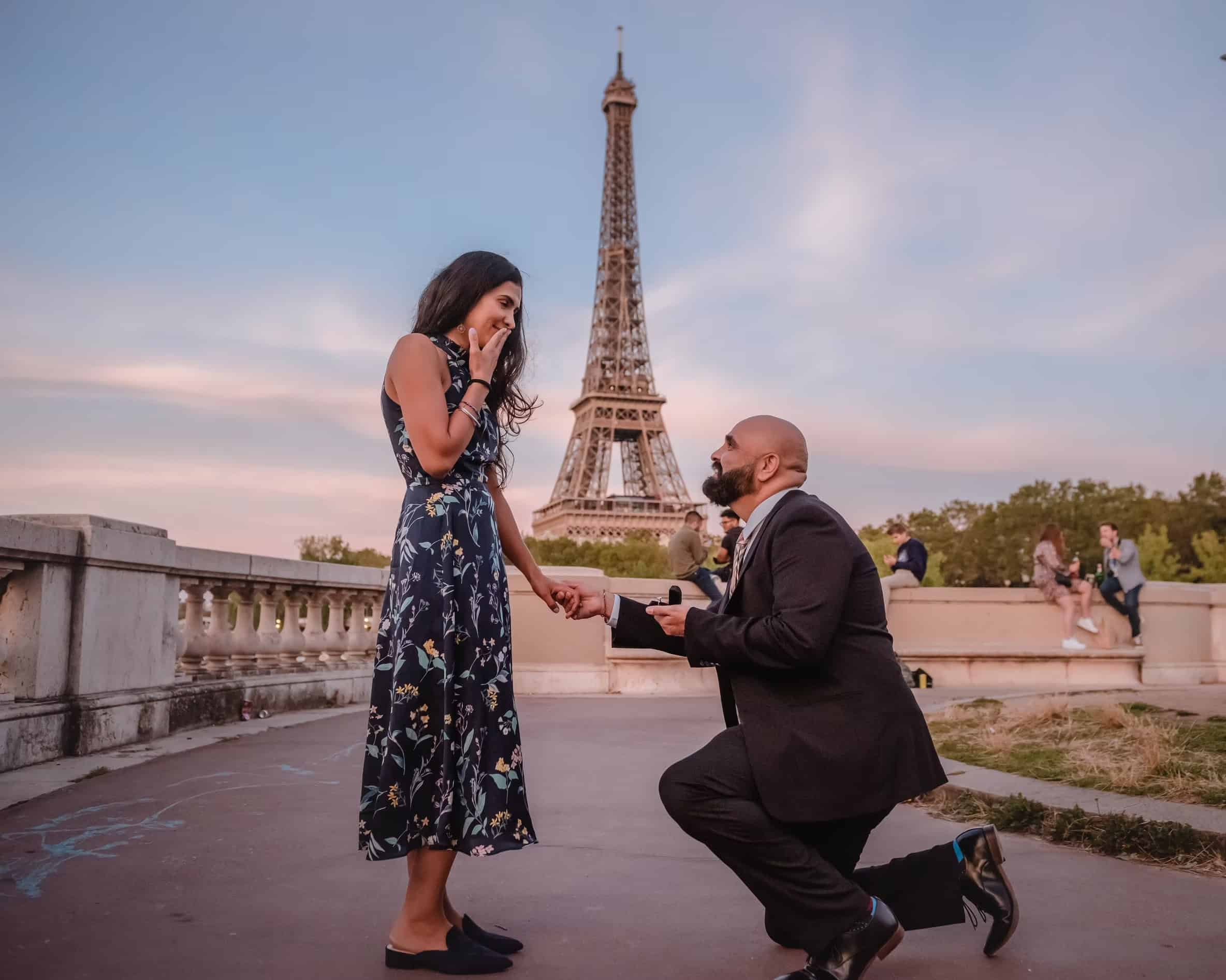 Surprise proposal at La France Renaissante statue with Eiffel Tower in Paris